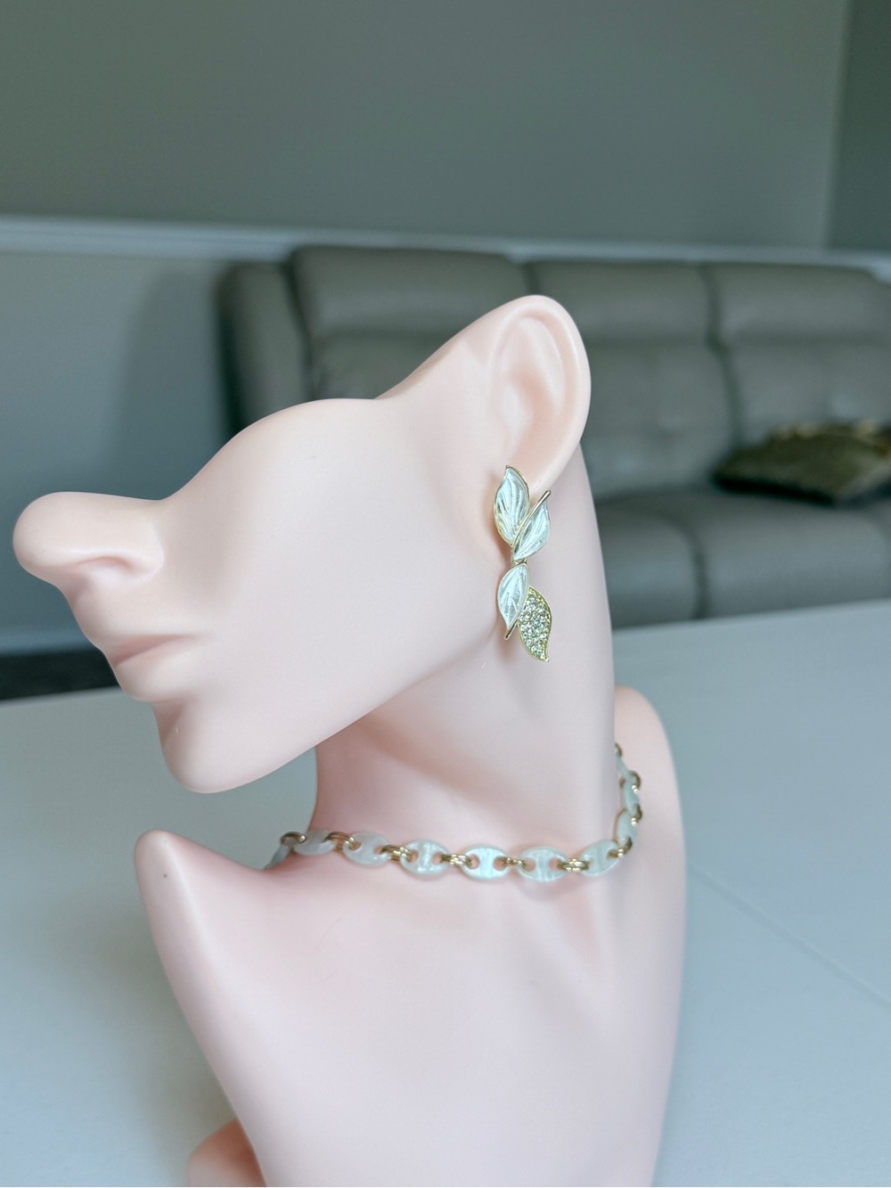 Elegant Gold Leaf Drop Earrings in White and Gold
